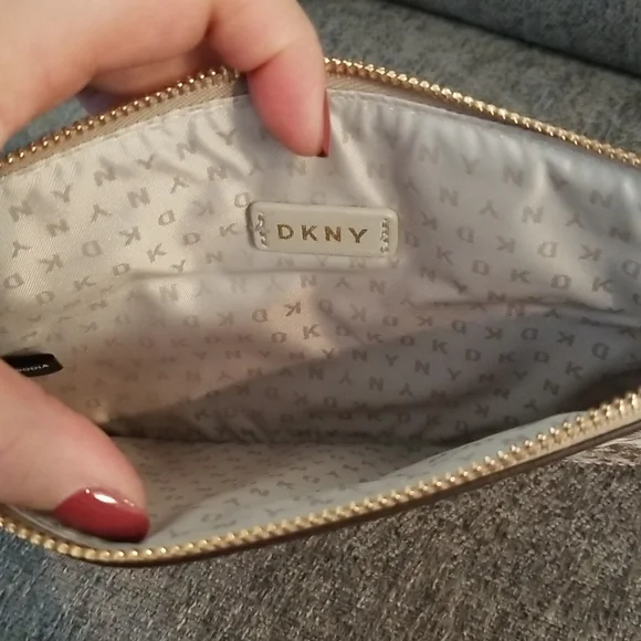 Brand new DKNY medium wristlet. Brown Graffiti pattern. Retails $78 - Picture 6 of 9
